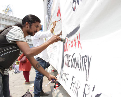 City artists celebrate citizenship through a public art installation at the ‘I’m NOTA fool event’ in Bangalore.
