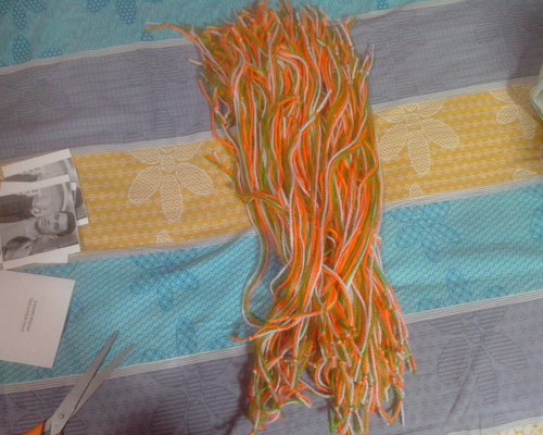 I put them in a cardboard box and then cut all three threads together in 50-cm long segments and tied knots at both ends. About 200 pieces were made in this way. 